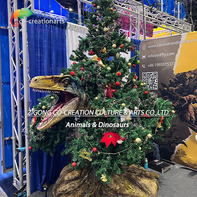 Αγορά Χριστούγεννα Animatronic Raptor δεινόσαυρος με διακόσμηση δέντρου για θεματικά πάρκα και εκδηλώσεις των εορτών διαδικτυακή κατασκευή